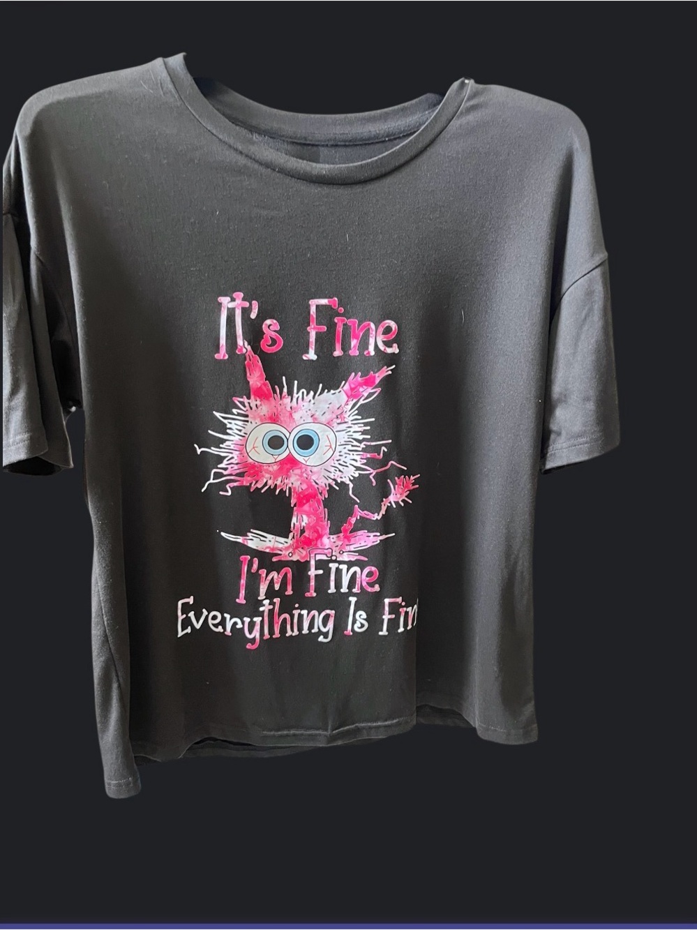 Lady’s Black Graphic Tee with Pink Character - "It's Fine"